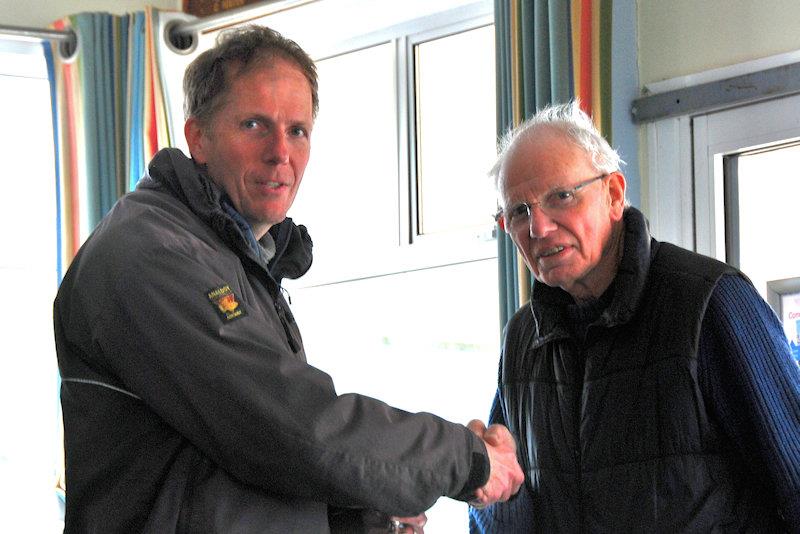 Peter Stollery collecting both the Footy Champion's Trophy & Videlo Globe from his RO dad - Footy National Championship at Frensham photo copyright Oliver Stollery taken at Frensham Pond Sailing Club and featuring the Footy class